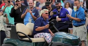 john-daly-still-drives-behind-the-t-shirt-and-wheel-after-all-those-years.jpg