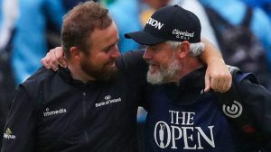 lowry-greets-caddy-martins-impact-in-open-victory.jpg