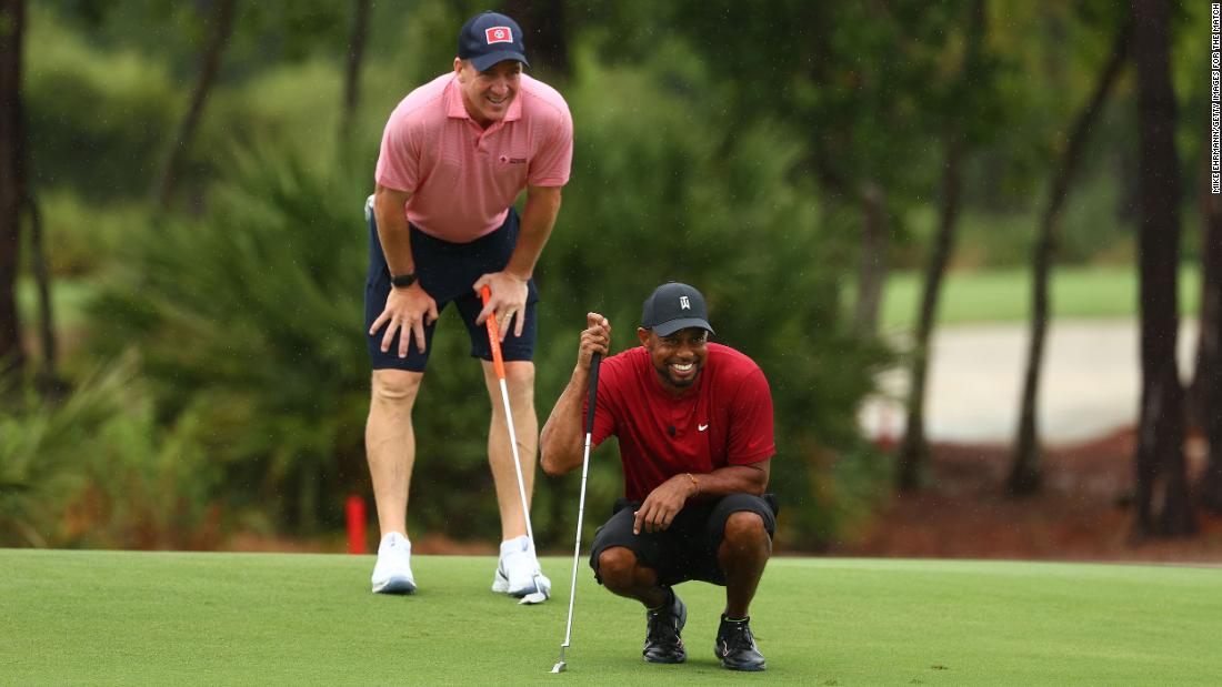 1596122055_tiger-woods-and-peyton-manning-win-the-match-ii.jpg